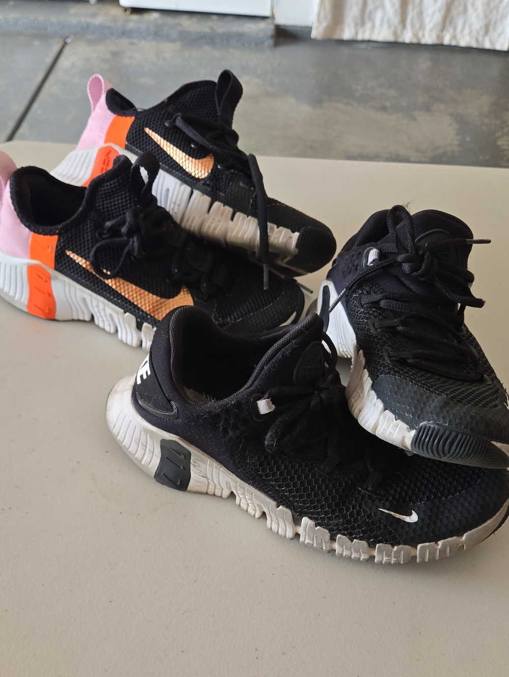Two pairs - NIKE METCON Size 7 Fair Condition